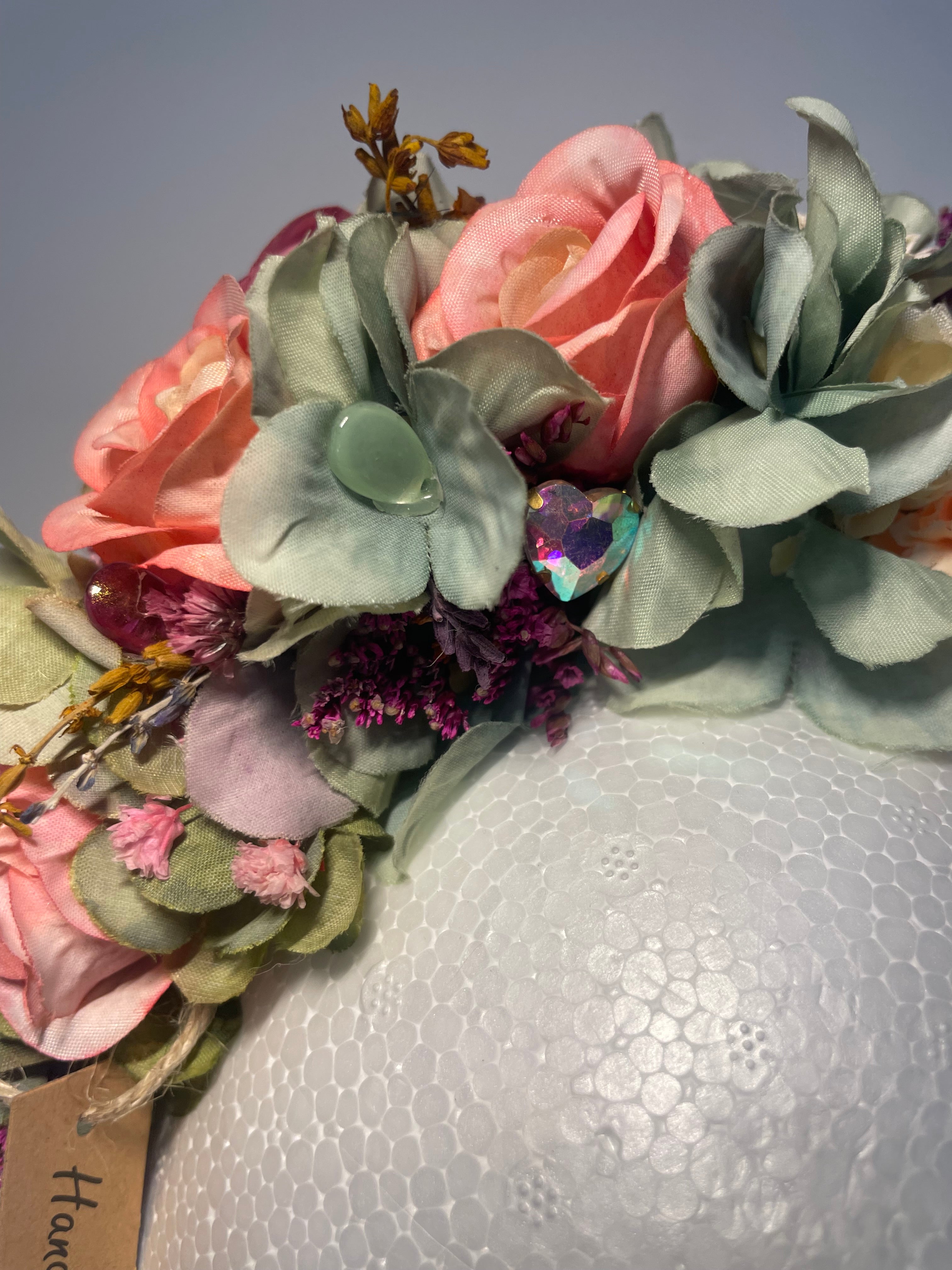 Gorgeous pink roses and green flowered headband