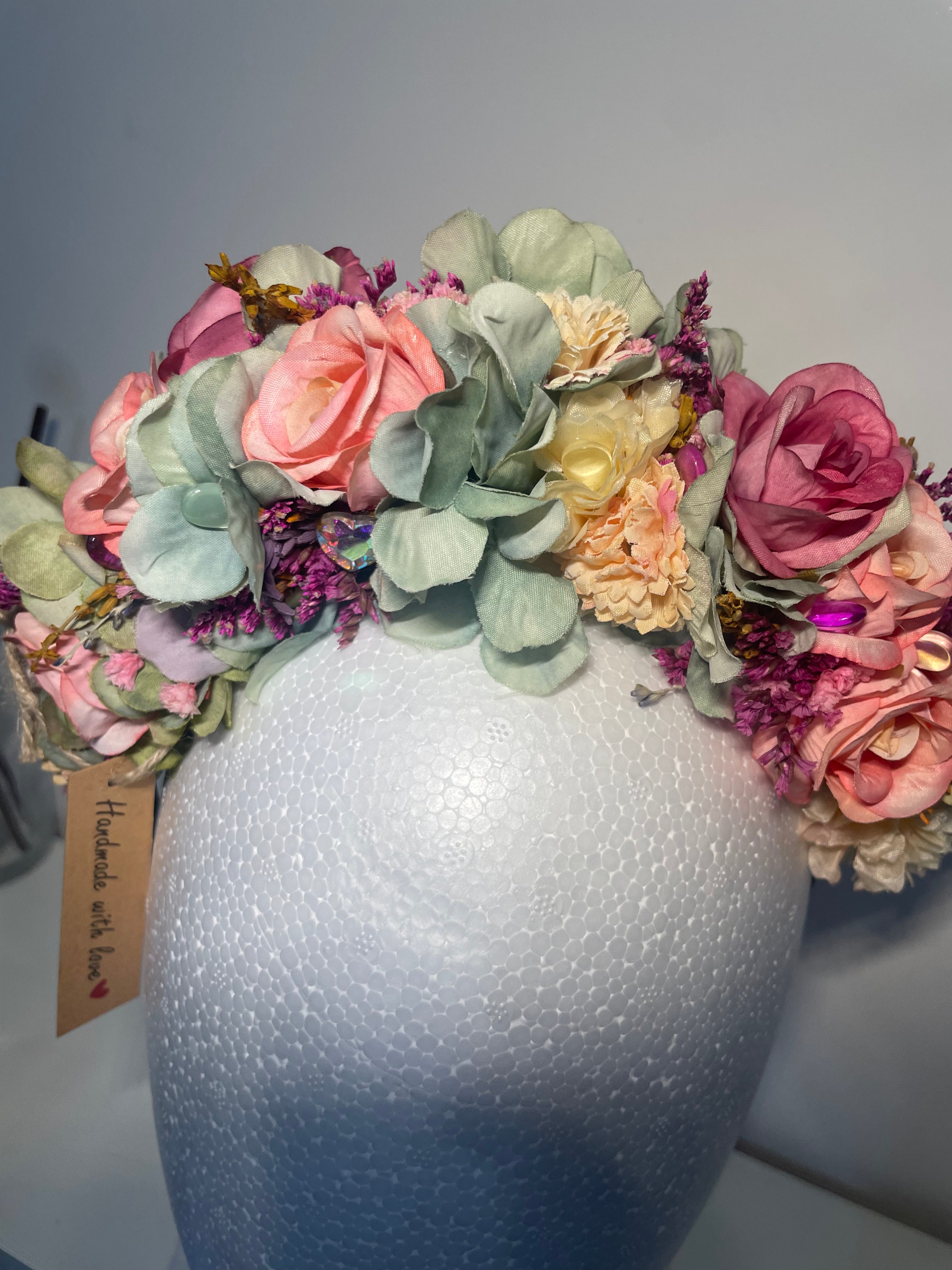 Gorgeous pink roses and green flowered headband