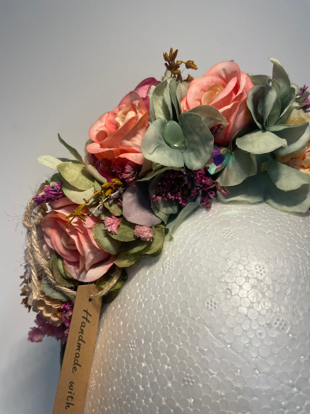 Gorgeous pink roses and green flowered headband